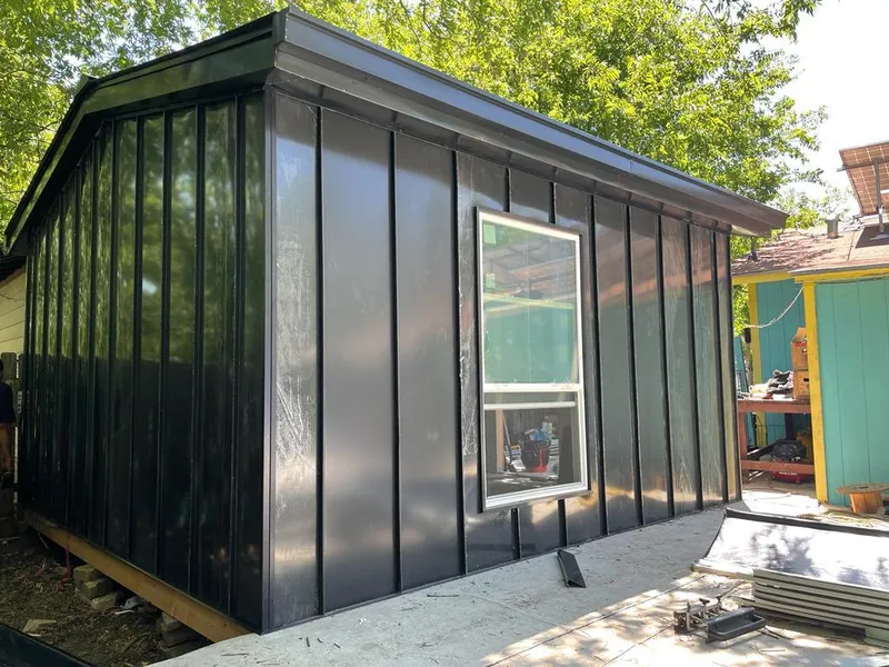 Black standing seam metal wall panels for Metal Roof Installation in Patton