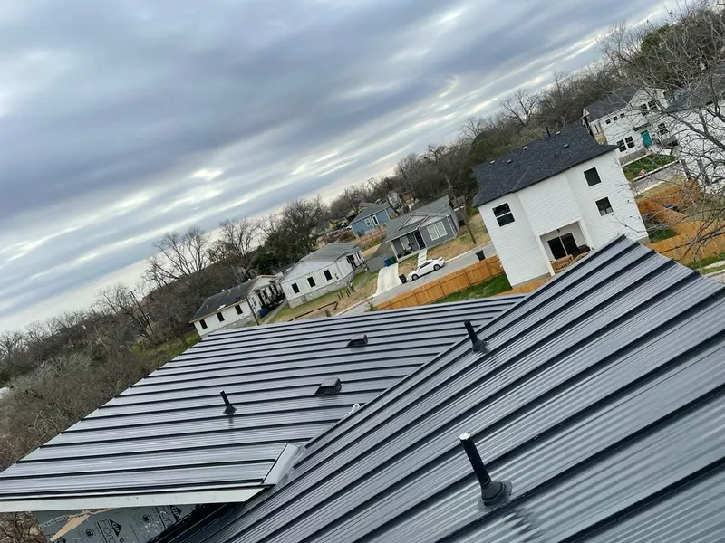 Standing seam metal roof panels with vents for Skylight Repair in Patton